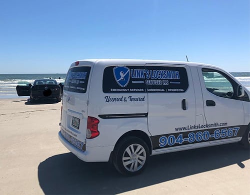 Link's locksmith van on a beach for a unique lockout service call!