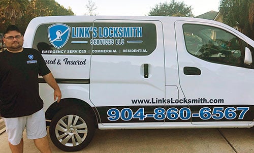Jesse Link, owner, in front of his locksmith van